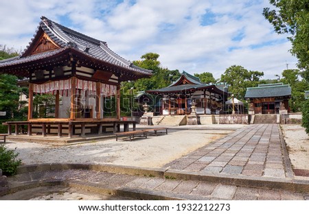The view of the inner territory of Shikichi-jinja Shrine (Wara-tenjin) with the Kagura-den building for the sacred kagura dance and Haiden. Kyoto. Japan