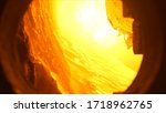 View inside of a blast furnace during the process of metal melting, heavy industry concept. Stock footage. Metallurgical production, hot workshop at the plant, engineering.
