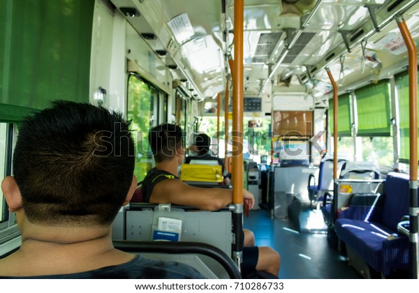 View from inside the
bus with passengers