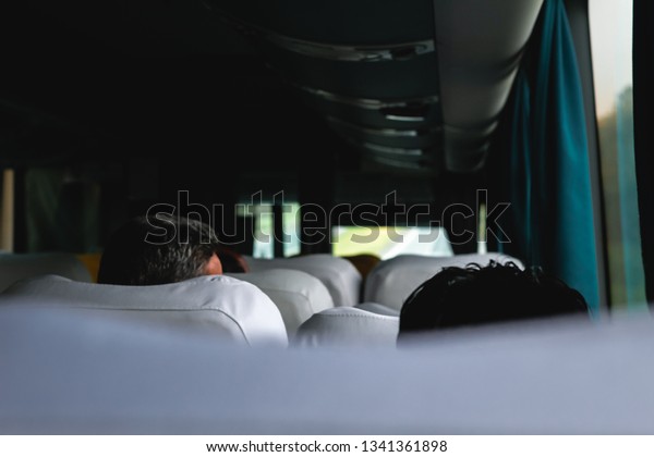 View from inside the bus with\
passengers/ transport, tourism, road trip and people\
concept