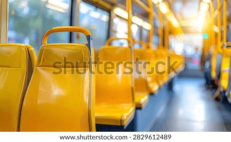 View inside a bus showing multiple rows of empty yellow seats, with sunlight streaming through the windows.