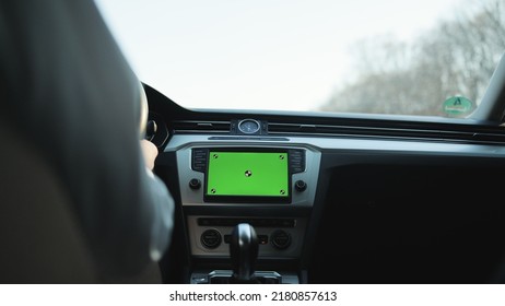 View Inside Car Young Man Driving Use Navigation App On Greenscreen Mock-up Display. Navigation Online App. Business People Lifestyle. Express Driveway Trip. Road Traffic.