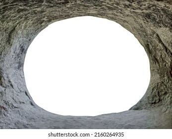 View from inside of cave or stone grotto hole in rocky mountains
