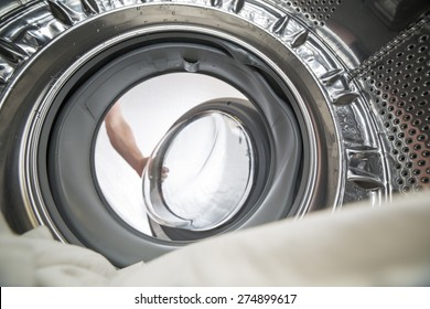 A View From Inside A Front Loading Washing Machine