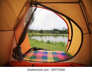 View Inside To Outside Of Yellow Tent Camping