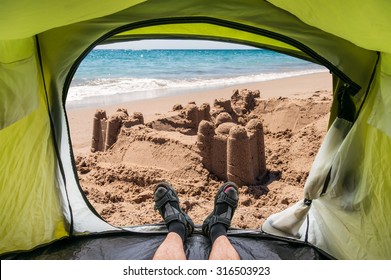 View From Inside A Tent On The Sand Castle On The Sea Shore