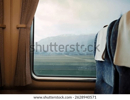 a view from inside a train, looking out through a large window