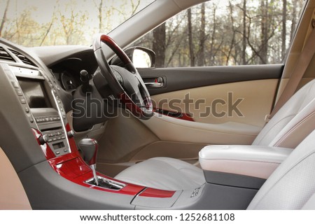 View of the interior of a modern automobile showing the dashboard. Car interior. 