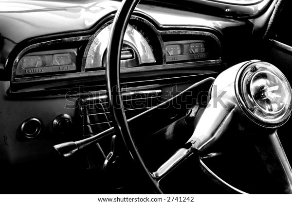 View of the\
interior of an old vintage\
car	