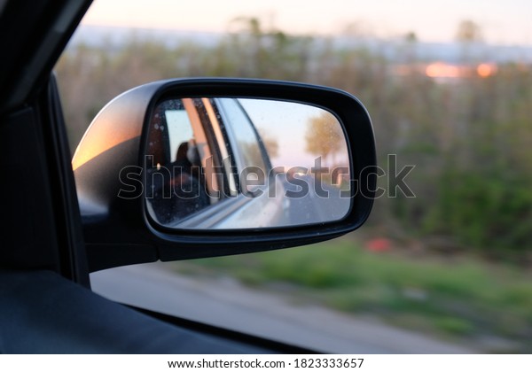 view into the rear\
view mirror of a car