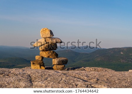 View of an Inukshuk at the summit of 