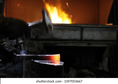 View Of The Ironsmith Or Blacksmith. Blacksmith, Also Called Smith, Craftsman Who Fabricates Objects Out Of Iron By Hot And Cold Forging On An Anvil.