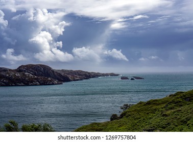 View From The Isle Of Harris Over The Minch. A Local Aquaculture Farm In The Background. The Outer Hebrides, Scotland.