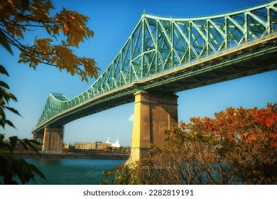 View of Jacques Cartier Bridge in Montreal during fall season in Quebec province in Canada