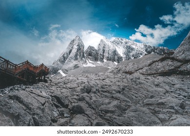 View of Jade Dragon Snow Mountain. Jade Dragon Snow Mountain is a mountain near Lijiang, in Yunnan province, southwestern China. - Powered by Shutterstock