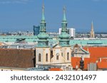 It Is view of Jesuit church (Jesuitenkirche). The University Church (Universitätskirche) is on Ignaz Seipel Platz in Wien. It is a panoramic view of old city center of Vienna. It