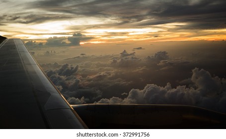 View From A Jet Plane Window High Sunset  Time , Dramatic Storm Clouds