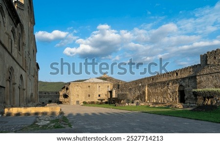 View of the Jvari Monastery of Mtskheta from the courtyard of the Svetitskhoveli Cathedral in the Mtskheta city in Georgia.                             
