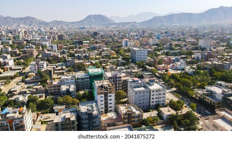 A View Of Kabul City, Construction Building Crowding People By Drone.