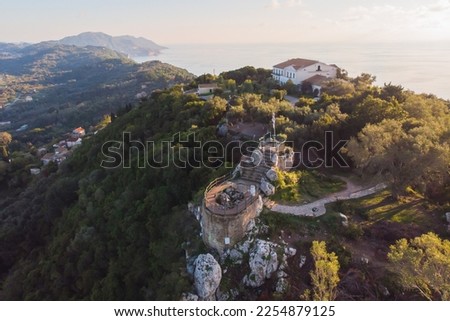 View of Kaiser's Throne observation deck lookout, Pelekas village, Corfu island, Greece, Kaiser William II summit Observatory panoramic summer view with mountains, sea and Kerkyra in the background