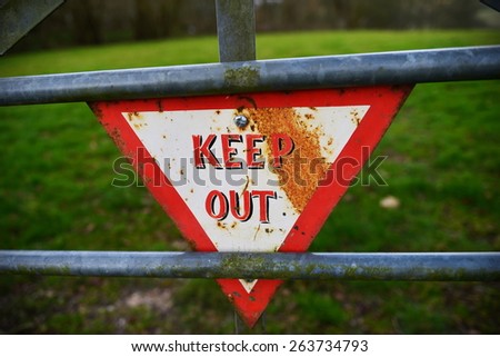 View of a Keep Out Sign on a Farmland Gate