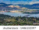 A view of the Kelowna Skyline, Okanagan Lake and the William R Bennett Bridge from Mount Boucherie in West Kelowna British Columbia Canada in the summer