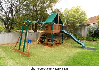 View Of Kids Playground In Green Backyard Garden