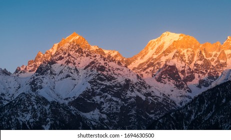 View of the Kinnaur Kailash mountain range during sunset