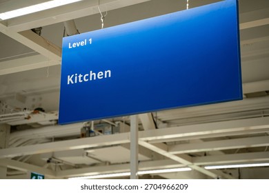 View of Kitchen section sign in store.
