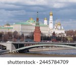 View of Kremlin, Armoury Chamber, Borowizki Turm, Cathedral of the Archangel, Ivan the Great Bell-Tower, Blagoveschenskaya Tower, Palace, Moskva river and Bolshoy Kamenny bridge in Moscow (Russia)