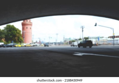 View Of Kremlin Embankment Under The Bolshoy Kamenny Bridge (Greater Stone Bridge). Abstract Urban Background Of Moscow. City Street Traffic, Beautiful City Skyline Background