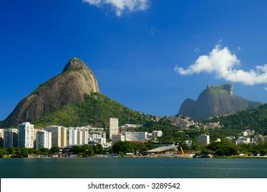 View Of The Lagoa Rodrigo De Freitas In Rio De Janeiro With The Pedra Da Gavea On The Background On A Beautiful Sunny Day