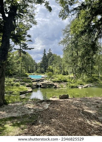 View of the lagoon and pool on the grounds of the Edsel and Eleanor Ford House estate in Grosse Pointe Shores, Michigan.