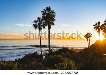 A view of Laguna Beach sunset at the beach. Laguna Beach is located in southern California.