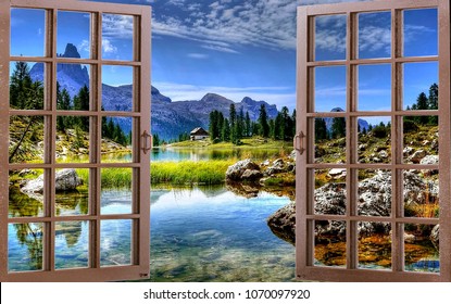 View of the lake and mountains through the window