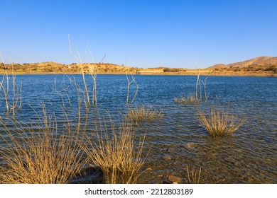 View Of The Lake Oanob, An Idyllic Holiday Resort With A Lake And A Dam Near Rehoboth In The Kalahari Desert. Namibia.