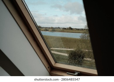 view of a lake through a window