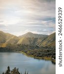 View of Lake Toba and beautiful green hills located in Samosir Regency. Natural view of the lake from the top of the hill. Beautiful nature.