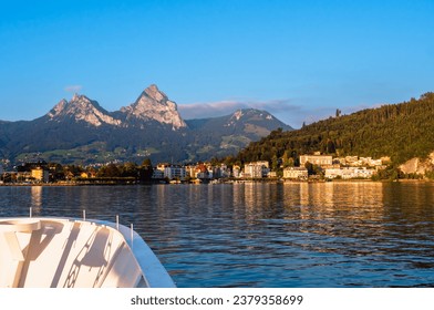 A view from the lake Urnersee or Lake Luzerne at Brunnen, a town in the political municipality of Ingenbohl, located on Lake Lucerne in the Schwyz district of the canton of Schwyz in Switzerland.