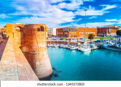 View of the landmark Fortezza Vecchia, an old fortress with a tower located in Livorno, a port city on the Ligurian Sea in Tuscany, Italy.
