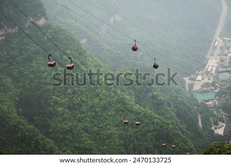 View landscape mountain and cable car cableway for chinese people foreign traveler travel visit Tianmen Shan cave or Heaven Gate in Tianmen Mountain National Forest Park at Zhangjiajie in Hunan China