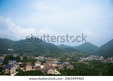 View landscape range mountain forest and cityscape hill valley village building with local life lifestyle of chinese people between journey on from Yichang to Zhangjiajie of Hunan city in Hubei, China