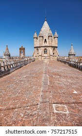The view of the lantern tower over the gable roof of Evora Cathedral (Basilica Cathedral of Our Lady of Assumption). Evora. Portugal