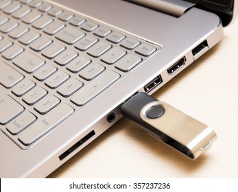 View Of Laptop Keyboard And USB Flash Drive