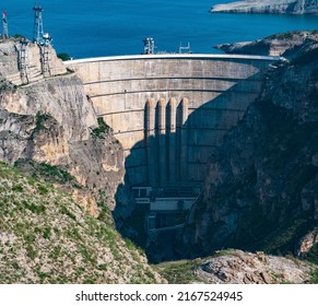 View Of Large Arch Dam Of The Hydroelectric Power Station In The Canyon