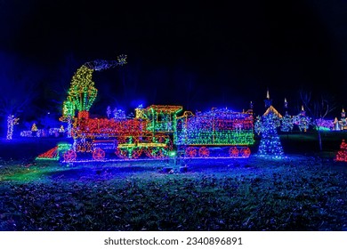 A View of a Large LED Steam Engine, With All Colors and Motorized, in a Large Drive Thru Display