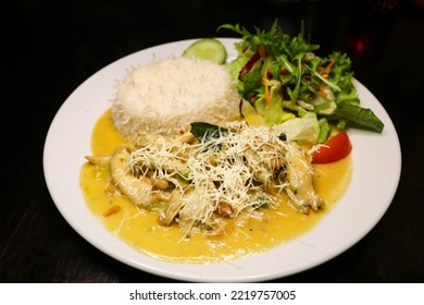 View Of A Latin American Dish Called Pina Con Pollo, Which Means Rice And Chicken, In A Restaurant Or Kitchen.