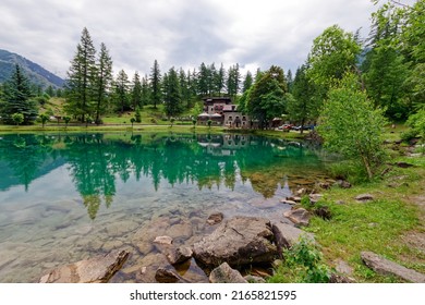 View of Laux lake, small alpine lake near Usseaux, in Val Chisone, Piedmont, Italy