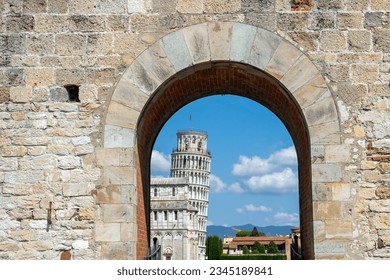 View of the Leaning Tower of Pisa from the city gate