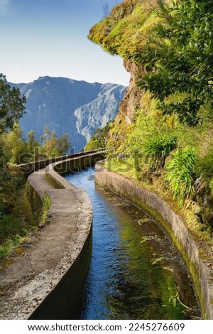 View from Levada do Norte on the portuguese island of Madeira. Spring in Madeira. Levada irrigation canal. Hiking in Madeira. Path next to the levada. Hiking in Madeira, Portugal. Levada Norte. 